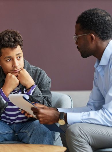 Teenage Boy Visiting Psychologist